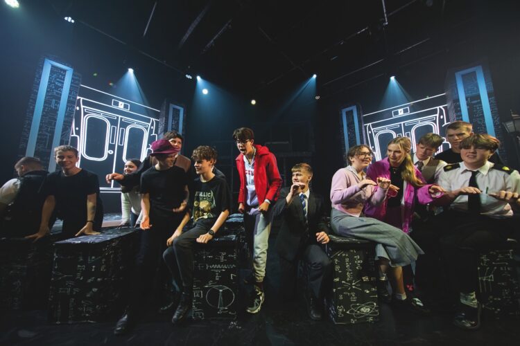 Trinity students performing alongside students from Meriden and Rosebank in The Curious Incident of the Dog in the Night-time.