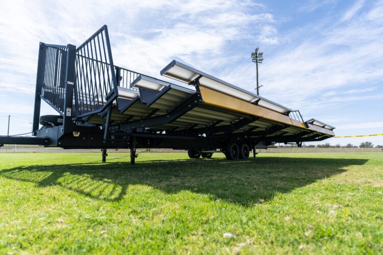 The Tow & Fold grandstand transforms from a compact towable trailer into a nine-tier grandstand seating up to 200 people. Image: Felton Industries