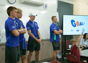 North Melbourne players at Werribee Primary, completing the Goal Accuracy Lesson with students. Image: The Huddle.