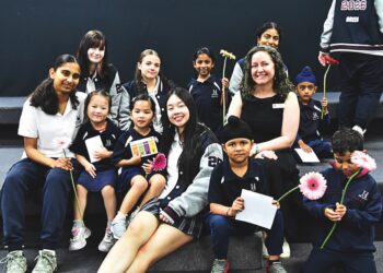 Principal Alina Page with students at The Heights School.
